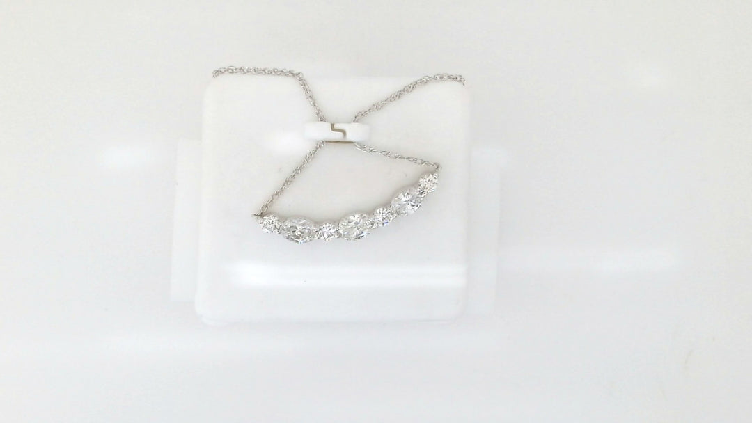 White Sterling Silver Free Form Pendant Length 18 With = 0.75Twt Oval F Vs2 Diamonds And = 0.25Twt Round F Vs2 Diamonds