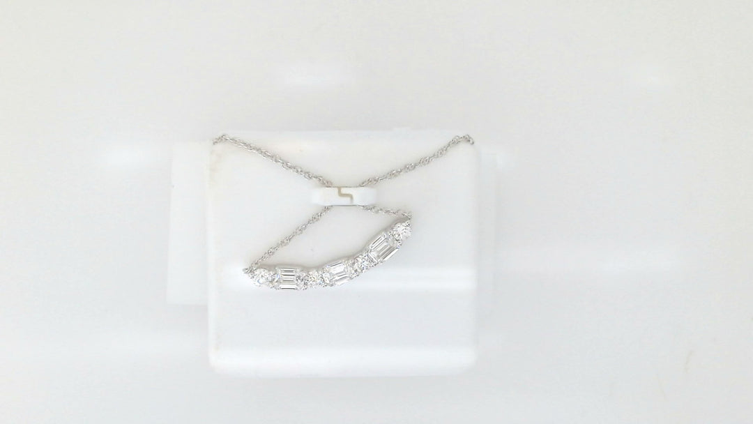 White Sterling Silver Free Form Pendant Length 18 With = 0.75Twt Emerald F Vs2 Diamonds And = 0.25Twt Round F Vs2 Diamonds