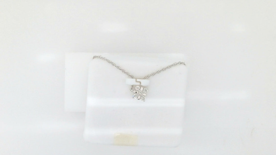 White Sterling Silver Pendant Length 18 With = 0.10Twt Round F Vs2 Diamonds Metal: Sterling Silver
Color: White
Finish: Polished