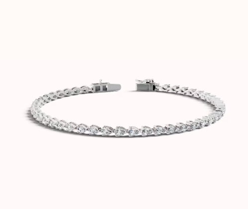 White 14 Karat Tennis Bracelet Length 7 = 7.50TWT Pear E/F VS1 Diamonds
