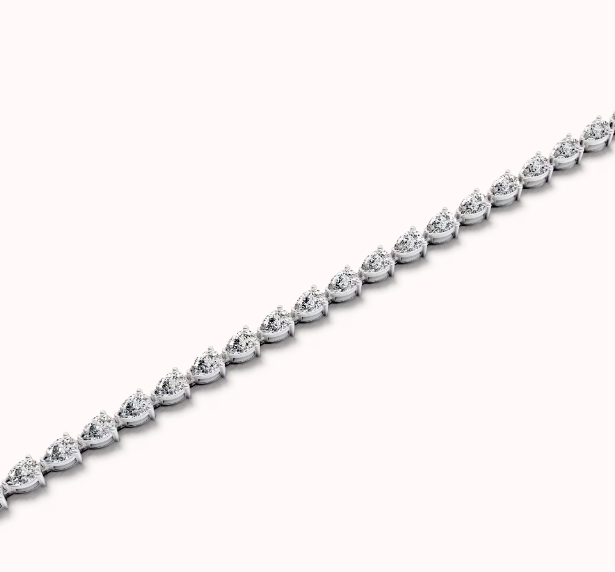 White 14 Karat Tennis Bracelet Length 7 = 7.50TWT Pear E/F VS1 Diamonds