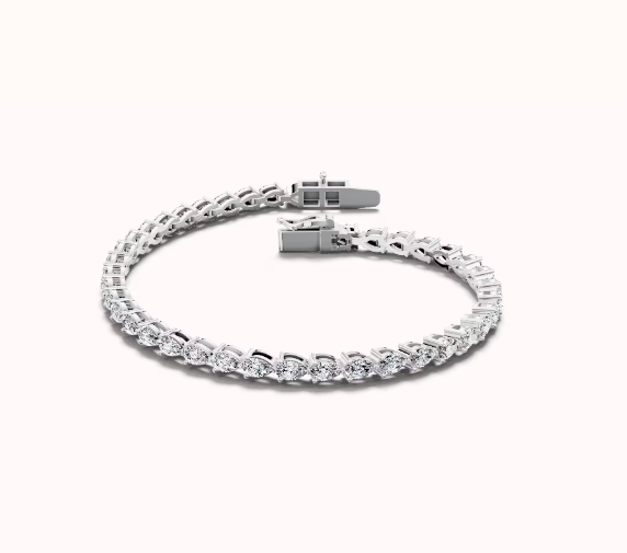 White 14 Karat Tennis Bracelet Length 7 = 7.50TWT Pear E/F VS1 Diamonds