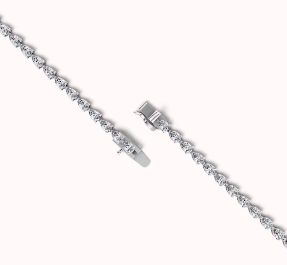 White 14 Karat Tennis Bracelet Length 7 = 7.50TWT Pear E/F VS1 Diamonds